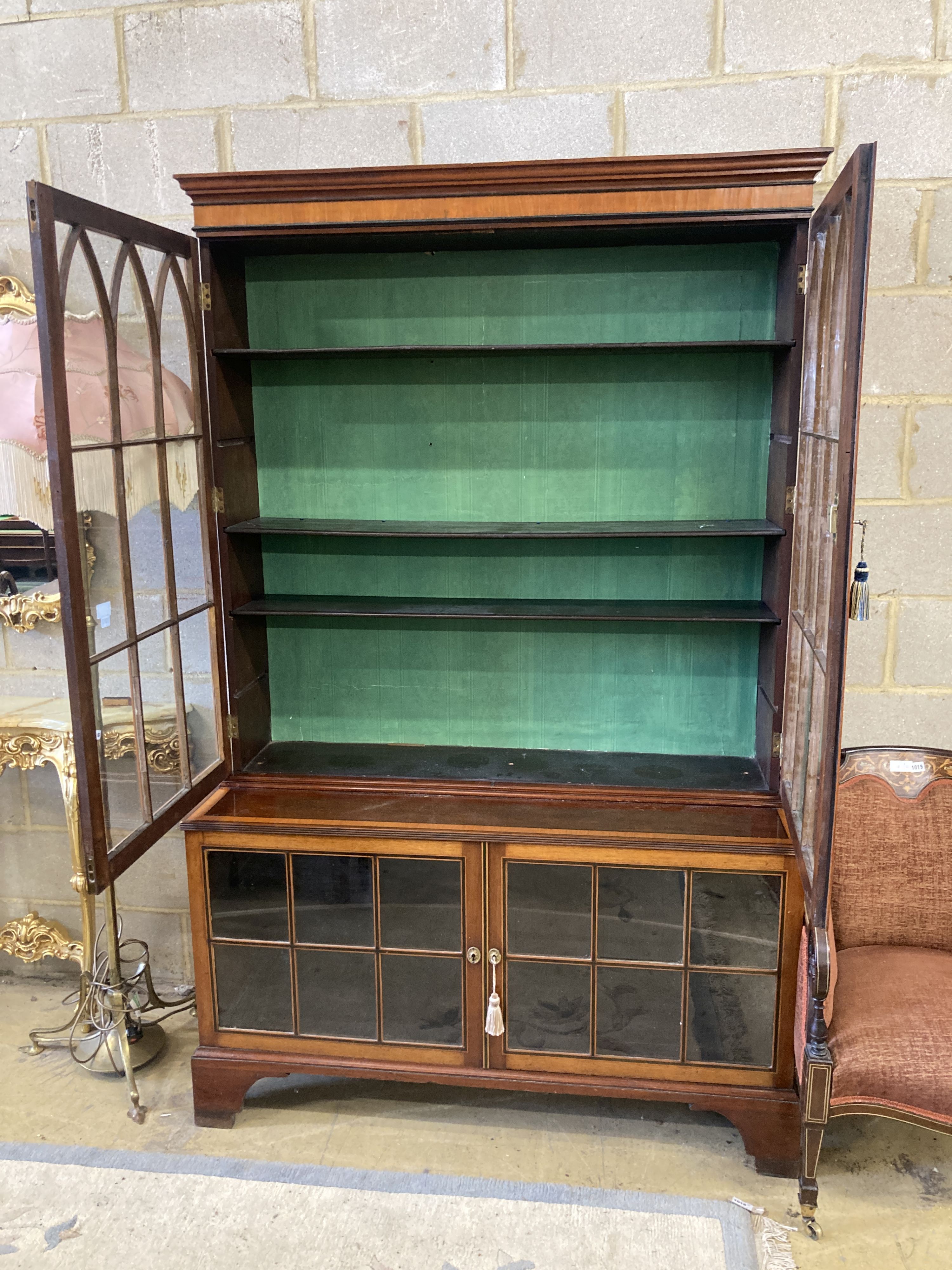 A George III style satinwood and ebony banded mahogany display cabinet, width 132cm, depth 50cm, height 208cm
